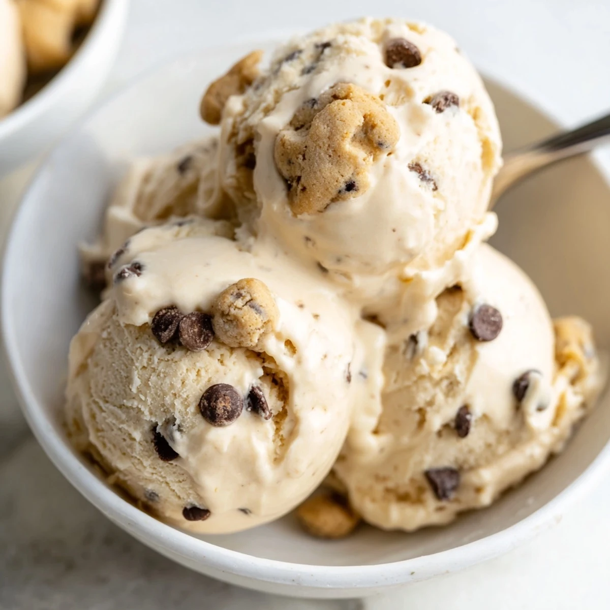 Creamy cottage cheese ice cream with cookie dough bites for a delightful dessert.  