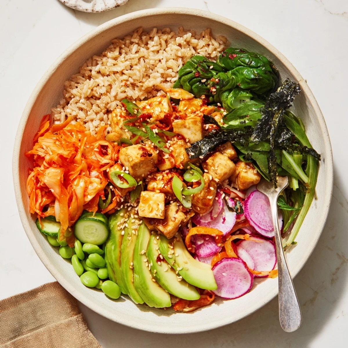 Hearty Fermented Vegetable Bowl topped with colorful veggies, grains, and a savory dressing.