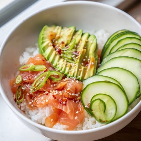 Quick and easy leftover salmon and rice bowl drizzled with savory soy sauce.  