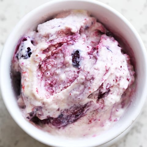 A close-up of homemade cottage cheese ice cream, ready to be scooped and enjoyed.