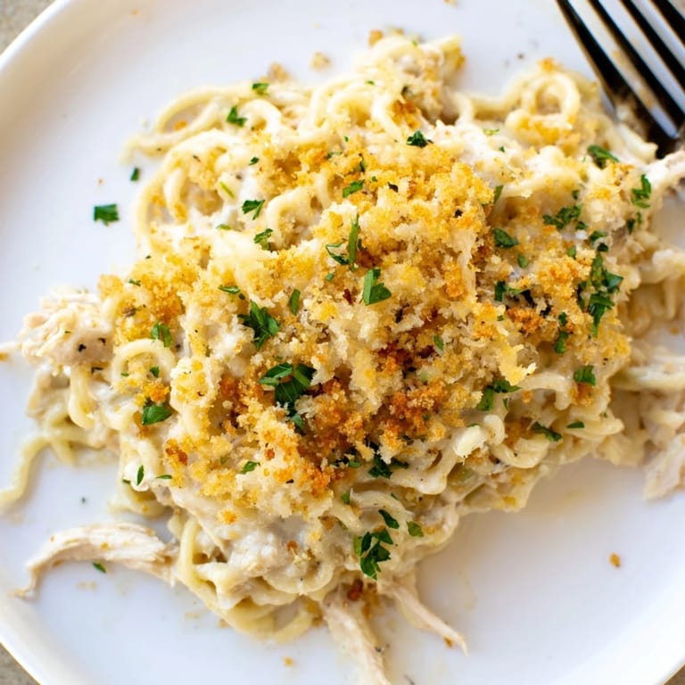 Golden, bubbling Garlic Parmesan Chicken Ramen Bake served fresh from the oven.