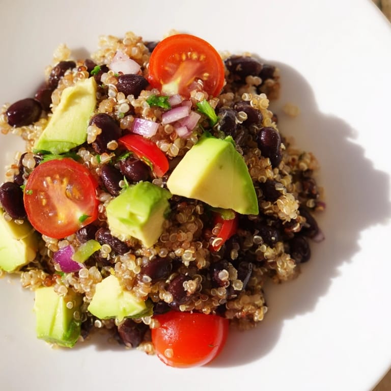 Cool, refreshing Quinoa Black Bean Salad ready to serve, perfect for a light vegetarian meal.