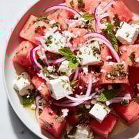 A vibrant Watermelon Feta Salad, featuring sweet watermelon and creamy feta, ready to enjoy.